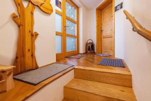 a meditation room with mats on the floor and a window at Hof Wegwarte in Weilheim
