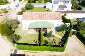 an overhead view of a house with a green roof at Casas Pepe 6 Bungalow in Los Caños de Meca +4 photos