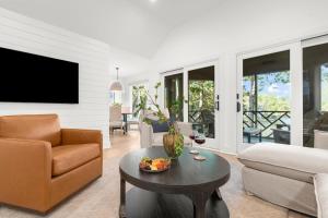 a living room with a couch and a table at 4826 Green Dolphin Way in Kiawah Island