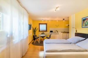 a living room with a couch and a table at Ferienwohnung Gernsbach in Gernsbach +20 photos