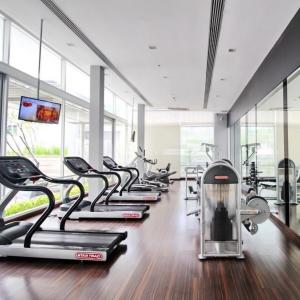 a row of treadmills in a gym at Diamond in Bangkok