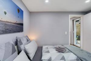 a bedroom with a bed and a window at Ferienhaus Adelon in Möhnesee