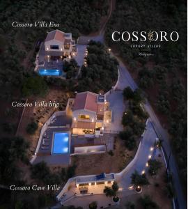 an aerial view of a mansion at night at Cossoro Cave Villa in Vasilikos