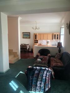 a living room with a couch and a table at Jrvezh House in Yerevan