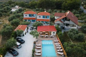 an aerial view of a house with a swimming pool at Studios River - Potos Escape with Pool and Views in Potos
