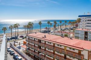 an aerial view of the beach and buildings at Sunny Seaside Studio in Benalmadena Costa