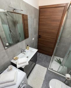 a bathroom with a sink and a shower at a casa di ASIA in Dalmine