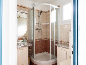 a bathroom with a shower and a sink at L'escale Kénanaise in Saint-Quay-Perros +25 photos