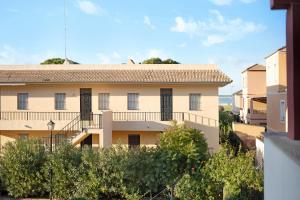 a view of a building from a balcony at Terrazas de doñana b91a in Sanlúcar de Barrameda