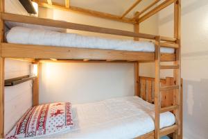 a bunk bed room with two bunk beds at Le Domaine du Lary in Saint-Lary-Soulan