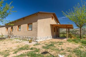 a small house in the middle of a field at Bungalow Alós in Alós de Balaguer