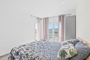 a bedroom with a bed and a window at Macisvenda relax in Macisbenda +24 photos