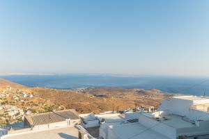 a view of the ocean from the top of a building at Haus Nikos - Tinos - Arnados in Arnados