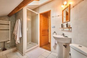 a bathroom with a sink and a shower at Chateau De Merande in Arbin +12 photos