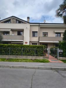 a building with a fence in front of it at Royal Residence Abano Terme in Abano Terme