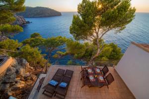 a view of the ocean from the balcony of a house at Mestral in Port de Soller