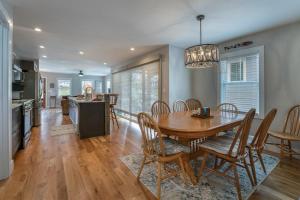 a dining room and kitchen with a table and chairs at Rosie`s Retreat · Rosie`s Retreat in Brevard
