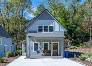 a tiny house with a porch at Rosie`s Retreat · Rosie`s Retreat in Brevard