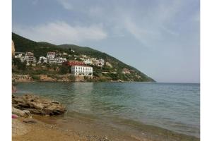 a town on a hill next to a body of water at Μaria's house 1 in Ilia