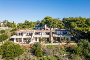 an aerial view of a house on a hill at Cala D'Aspide in Santa Caterina di Nardò