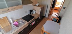 an overhead view of a kitchen with a sink at Ferienwohnung Mücheln 1 in Mücheln