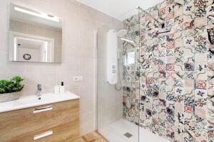 a bathroom with a shower and a sink at La Carpinteria in Tacoronte +31 photos