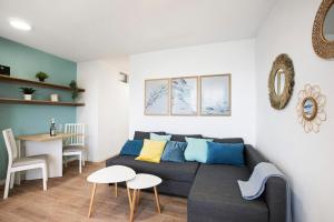 a living room with a couch and a table at Mypris Home 2 in Tacoronte