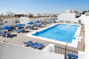 an image of a swimming pool on the roof of a hotel at Casa Noria in Vejer de la Frontera
