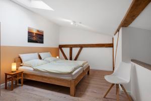 a bedroom with a bed in a room at Ferienwohnung Junge 4 in Lohe-Rickelshof