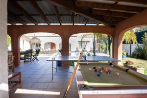 a pool table in the middle of a patio at Paulina in Jávea