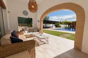 a living room with a couch and a table at Paulina in Jávea