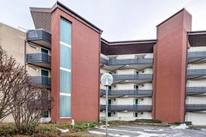 a building with balconies on the side of it at Studti 134 in Beuren