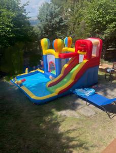 a large inflatable water slide in a park at Stef House in Rivisondoli +6 photos