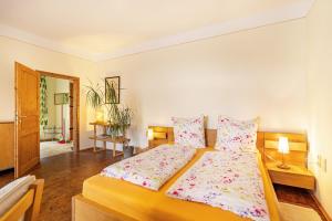 a bedroom with a bed with two pillows at Gemütliches Apartment In Lohmen in Lohmen