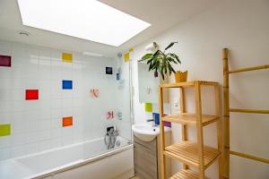 a bathroom with a sink and a shower and a toilet at Gite des Bois du Charme in Chalais +22 photos