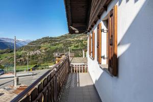 a balcony of a building with a view of a mountain at Lo Sondzo in Nus