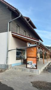 a building with a sign on the side of it at Salty Sol in Leutkirch im Allgäu