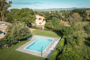 an aerial view of a villa with a swimming pool at I Profumi Dell'Orto - Campagnatico in Campagnatico