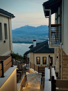a view from the balcony of a building with mountains at Aje Villas 1959 in Ioannina