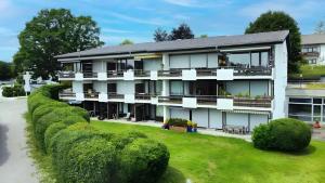 an exterior view of a building with bushes at Schönblick in Höchenschwand