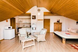 a living room with a couch and a table at Jonagold in Stockach