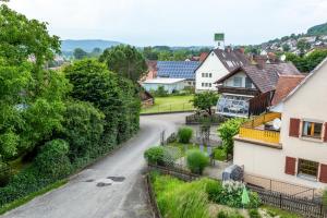 an empty street in a village with houses at Jonagold in Stockach +2 photos