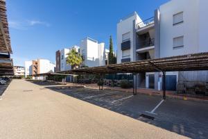 an empty street in a city with tall buildings at Apartamento Luz De Baria in Vera