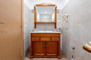 a bathroom with a sink and a mirror at Masía Costa Daurada in Tarragona +36 photos