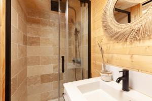 a bathroom with a sink and a shower at Bali House in Peypin +12 photos