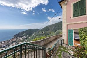 a balcony with a view of the ocean at Bilo Costella in Bonassola