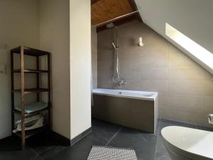 a bathroom with a sink and a bath tub at Vorwerk Biensdorf in Lichtenau +37 photos