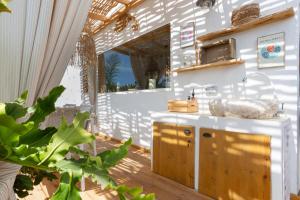 a bathroom with a sink and a mirror at Oceania Villa B, Private Pool in Chayofa