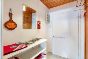 a room with a white counter and a door at Haus Am Bühl in Schönau im Schwarzwald +42 photos