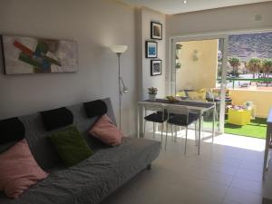 A seating area at Apartment Los Cristianos Még 21 kép